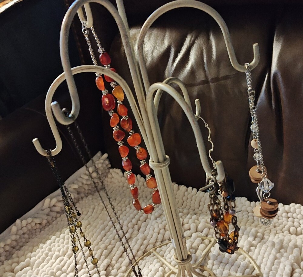 Several Beaded Necklaces And One Bracelet